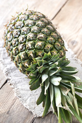 Pineapple on the wooden background