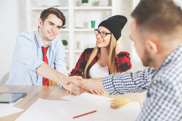 Obraz premium Young guy accepted for a job