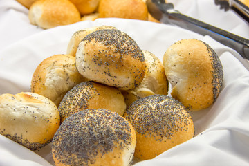 Buns with poppy seed in basket