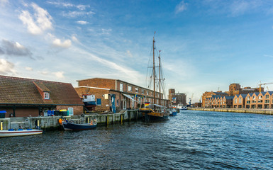 Naklejka premium View of Wismar Old harbor with ships and houses, Germany