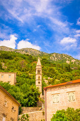 Fototapeta premium beautiful mediterranean landscape. Mountains and fishing boats near town Perast, Kotor bay (Boka Kotorska), Montenegro.