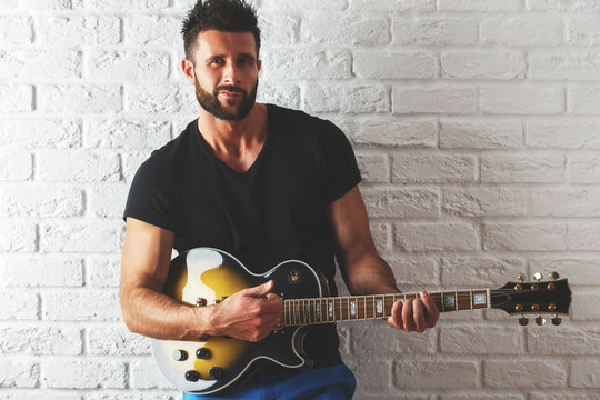Guy playing the guitar