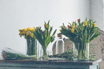 Spring flowers on a wooden table