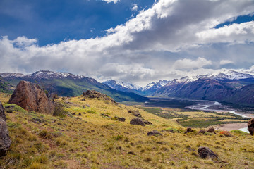 Argentina, Patagonia, El Chalten area. Trekking to the Laguna Capri and Fitz Roy Mountain. Landscape view to the river Rio de las Vueltas valley. Sky with the clouds.