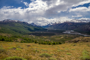 Argentina, Patagonia, El Chalten area. Trekking to the Laguna Capri and Fitz Roy Mountain. Landscape view to the river Rio de las Vueltas valley. Sky with the clouds.