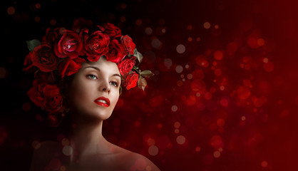 Beautiful girl with flowers on a red background