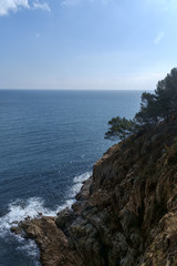 Fototapeta na wymiar Cliff and sea in Tossa de Mar. Spain