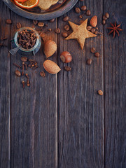 Homemade gingerbread cookies, spices and decorations