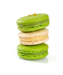 pistachio and vanilla  macaroons isolated on white