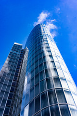 Obraz na płótnie Canvas Blue skyscraper facade. office buildings. modern glass silhouettes of skyscrapers