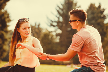 Upset lady rejects her man.