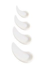 Cosmetic cream in abstract shape on background