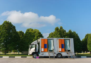 A mobile toilet car
