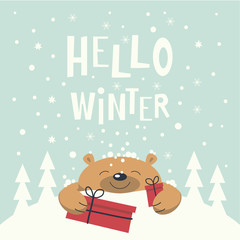 Christmas card. Brown bear lies on a snowdrift holding gift boxes in paws. Christmas trees on the snowdrift . Snowflakes falling. Phrase hello winter.