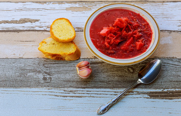 Traditional Ukrainian borsch with sour cream