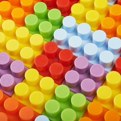 Surface covered with toy bricks