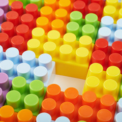 Surface covered with toy bricks