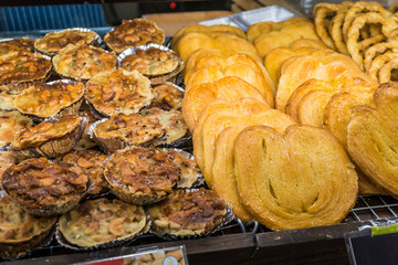 Bread or bakery on shelf staple food with a group of baked goods from dough or home cooking in store or supermarket