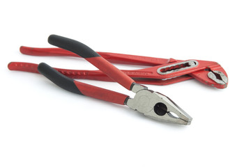 Red pliers and Red adjustable wrench isolated on white background