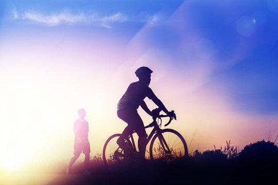 Ride bicycle at sunset