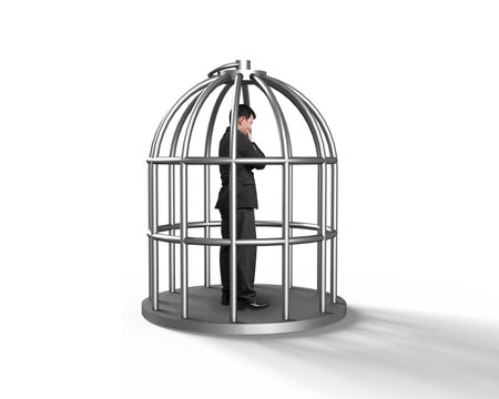 Cage with man thinking inside