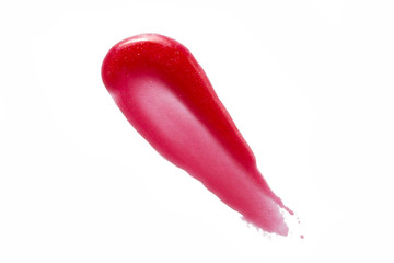 Red color lip gloss paint drop on background