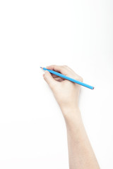 A woman hand hold a blue color pencils isolated white.
