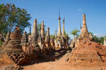 Ancient stupas of the  Shwe In Dein pagoda. Sunny day. The surroundings of Inle lake, Myanmar