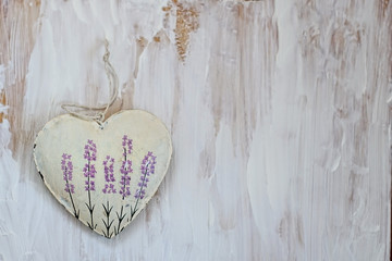 decorative vintage heart with lavender picture close up on rustic wooden background. Valentine's day, 14 february holiday concept. symbol of love, romance. gentle provence style. flat lay. copy space