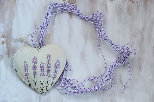 decorative vintage heart with lavender picture close up on rustic wooden background. Valentine's day, 14 february holiday concept. symbol of love, romance. gentle provence style. flat lay