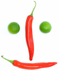 chilli pepper and lemon isolated on a white background
