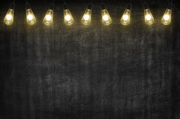 black chalkboard compose wtih open light bulb