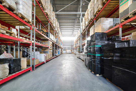 Long shelves with a variety of boxes and containers.