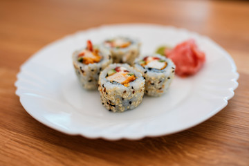 Sushi on white plate