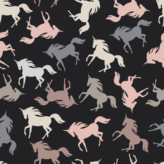 Realistic unicorn silhouette seamless pattern. Vector. © Olga Skorobogatova