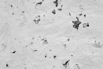 Wall fragment with scratches and cracks