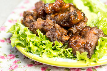 delicious fried chicken wings with vegetable