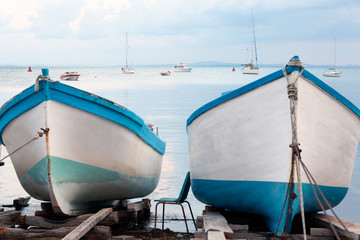 Boats moored by the shore