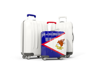 Luggage with flag of american samoa. Three bags isolated on white