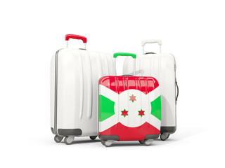 Luggage with flag of burundi. Three bags isolated on white