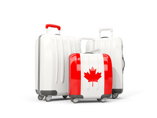 Luggage with flag of canada. Three bags isolated on white