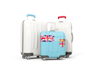 Luggage with flag of fiji. Three bags isolated on white