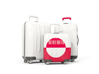 Luggage with flag of greenland. Three bags isolated on white