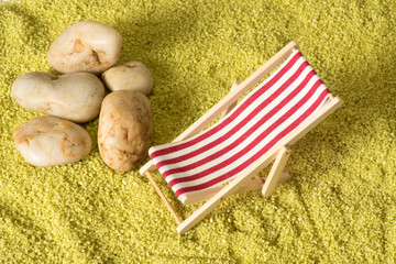 Liegestuhl und Urlaub am Strand