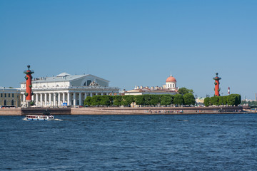 View of St. Petersburg. Rostral columns in sunny day. Saint-Petersburg Russia.