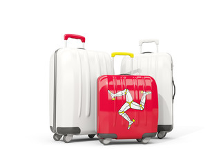 Luggage with flag of isle of man. Three bags isolated on white