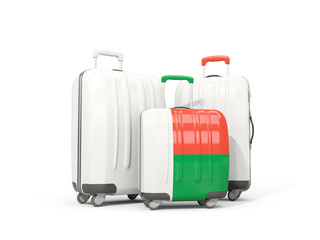 Luggage with flag of madagascar. Three bags isolated on white