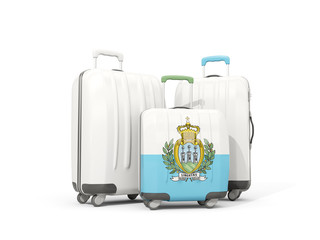 Luggage with flag of san marino. Three bags isolated on white