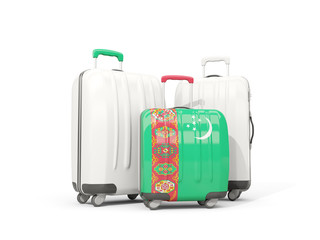 Luggage with flag of turkmenistan. Three bags isolated on white