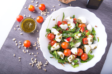 Plate of green salad with vegetables